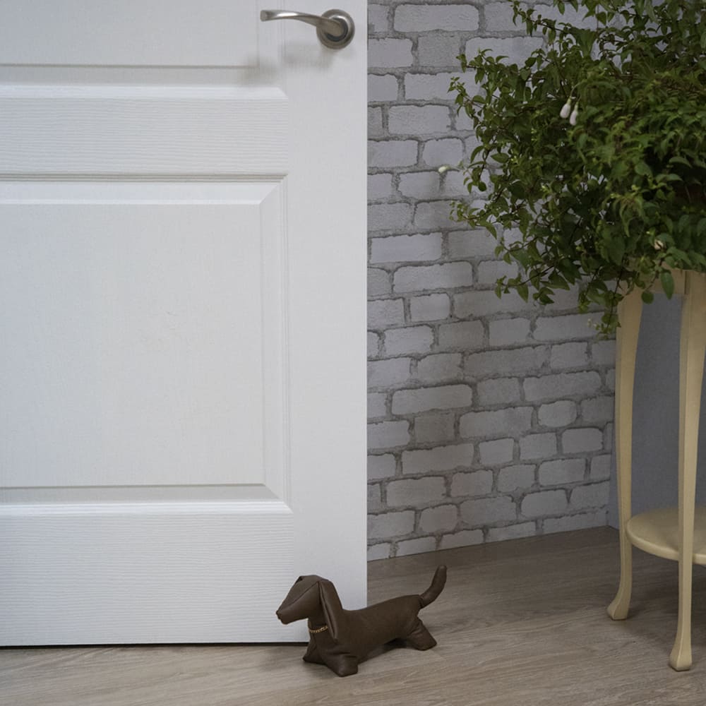 Стоппер Такса напольный